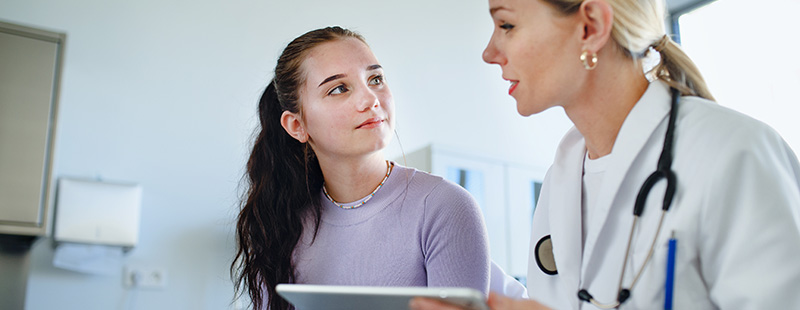 Doctor communicates with patient
