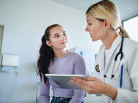 Doctor communicates with patient